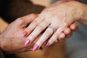 Close-up of an engagement ring on a bride’s hand during an engagement photoshoot