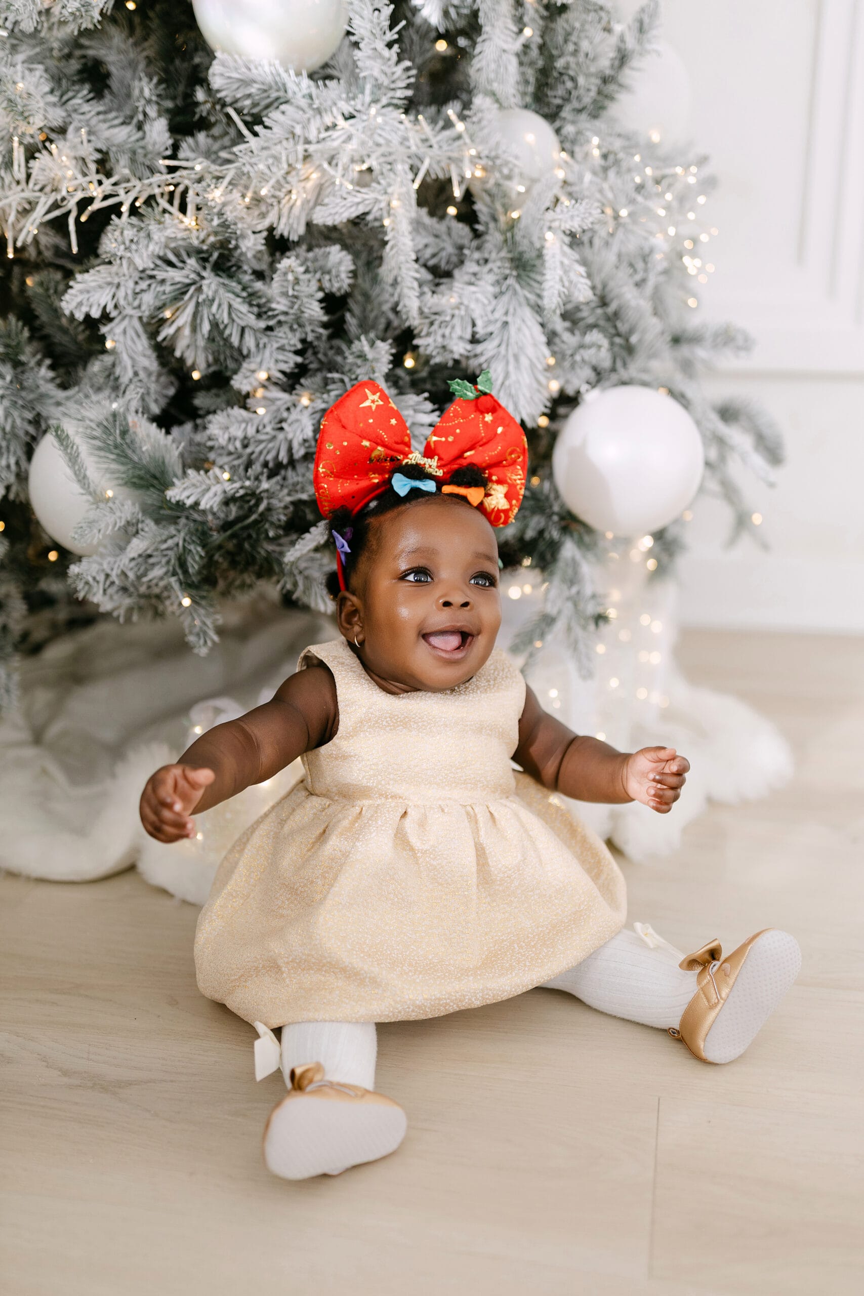 Baby portrait from a Christmas family photoshoot in a festive setting